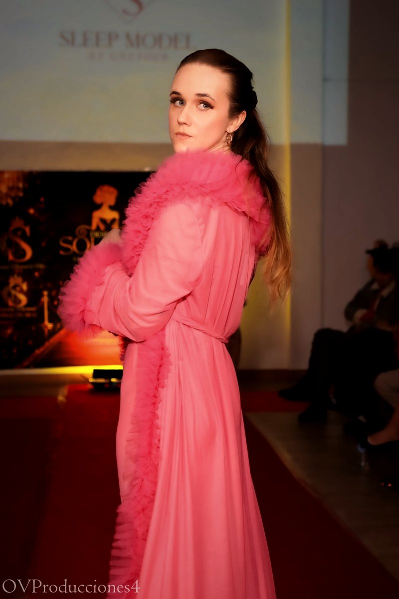 Runway in a pink ruffled gown